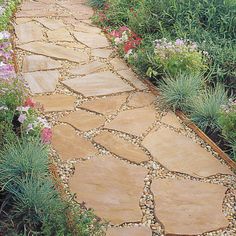 an image of a stone path with flowers and plants on the other side that reads, i may be able to get the flag stone locally