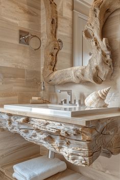 a bathroom with wooden walls and flooring next to a white sink under a mirror