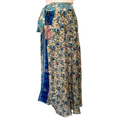 Stunning Nwt Sacred Threads Blue Floral Reversible Wrap Maxi Skirt One Size New With Original Tag. This Mixed Media Skirt Features A Beautiful Floral Pattern With Embroidered Trim Accents, Made With Lightweight (Polyester)Chiffon Fabric And A High Rise Design. The Skirt Has A Tie Closure And Is Perfect For Any Occasion, Whether It Be For Travel, Party/Cocktail, Or Casual Wear. Handmade In India, This One Size Skirt Is Perfect For The Stylish Woman Who Loves A Versatile And Comfortable Piece Of C Blue Patchwork Maxi Skirt For Spring, Blue Patchwork Skirt, Blue Long Wrap Skirt For Festival, Blue Patchwork Relaxed Fit Skirt, Sacred Threads, Wrap Maxi Skirt, Embroidered Trim, Travel Party, Chiffon Fabric