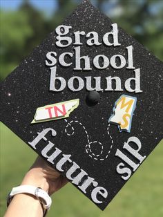 a black graduation cap that says grad school bound in future up on it's side