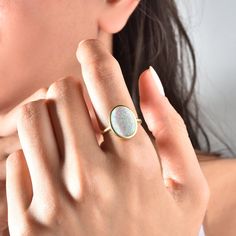 Opal Ring, Vintage Opal Ring, Minimalist Ring, Mother's Day Gift, October Birthstone Ring, Stacking Ring, Gift For Her Elevate any look with our Vintage Opal Ring. This minimalist piece exudes timeless charm, making it a perfect gift for Mother's Day or October birthdays. Crafted with care, its iridescent opal centerpiece adds a touch of elegance to any outfit. Stack it or wear it solo for understated luxury. A beautiful minimalist piece to have in ones collection 🎀 Free Returns and Money-back Gift Emerald Ring With Round Band, Cabochon Opal Promise Ring Open Style, Minimalist Opal Rings For Gifts, Fine Jewelry Opal Ring With Round Band, Minimalist Opal Rings For Gift, 14k Gold Opal Open Ring Gift, Oval Opal Stackable Rings As Gift, Opal Ring With Round Band For Promise, Adjustable Fine Jewelry Opal Ring