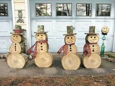 four snowmen are standing in front of a garage door with the words diy project ideas using wood wedges or logs