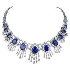 The Following Item we are offering is a Rare Important Spectacular and Brilliant White Gold Large Gorgeous Fancy Blue Sapphire Diamond Draped Necklace. Necklace consists of Rare Fine Magnificent Glittering Blue Sapphires and Gorgeous Diamonds! T.C.W. Over 60CTS!!! Can be purchased with a Pair of Matching Earrings separately (see photo 2 and photo 3). This Magnificent Necklace is a Rare Sample Necklace from a Private Top Manufacturer that sold to Five Store Hotels and Fine Jewelry Stores around t Luxury Blue Engraved Necklaces, Luxury Blue Delicate Jewelry, Fancy Items, Graff Jewelry, Sapphire Diamond Necklace, Bridal Diamond Necklace, Art Jewelry Design, Jewelry Design Drawing, Blue Sapphire Diamond