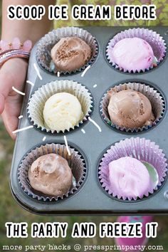 someone holding a muffin tin filled with cupcakes and ice cream before baking