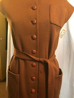 Retro A-line Vintage Dress For Fall, Vintage Brown Lined Dress, Retro Brown Lined Dress, Retro A-line Fall Dresses, Retro Brown Dress For Fall, Fitted Retro Vintage Dress For Fall, Fitted 70s Inspired Fall Dresses, 70s Inspired Fitted Fall Dresses, Retro Brown Dress With Buttons