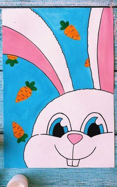 a painting of a bunny with carrots on it