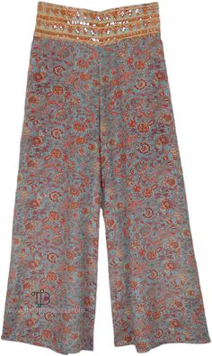 Floral prints on wide-leg pants which are soft and flowy, and have an exotic shining bohemian embroidered and sequined waist. The loose-fit wide-leg printed rayon pants have a comfortable waist with back elastic that will fit a small to a large, ideal for Medium to Large. #tlb #SplitSkirtsPants #beachwrap #Printed #bohemianfashion #festivalpants Floral Print Rayon Wide Leg Pants, Bohemian Rayon Pants With Floral Print, Printed Bohemian Bottoms For Fall, Bohemian Printed Bottoms For Fall, Bohemian Wide Leg Bottoms With Floral Print, Hippie Wide Leg Bottoms With Floral Print, Fall Bohemian Printed Bottoms, Bohemian Floral Print Pants For Loungewear, Hippie Style Floral Print Wide Leg Pants