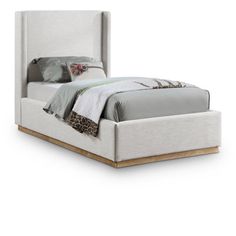 a bed with a white headboard and foot board on top of it, in front of a white background