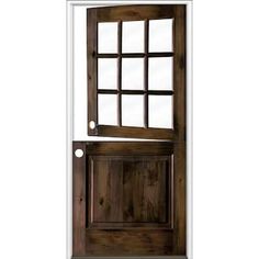 the front door is made from wood and has a glass paneled window on one side