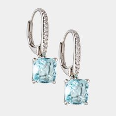 Sophisticated sparkle radiates from the cushion-cut aquamarine-colored stone that drops from these earrings. Aquamarine Drop Earrings For Formal Occasions, Formal Cushion Cut Aquamarine Jewelry, Elegant Blue Topaz Cushion Cut Jewelry, Elegant Blue Cushion Cut Earrings, Blue Cushion Cut Aquamarine Jewelry, Elegant Aquamarine Drop Earrings, Elegant Silver Aquamarine Earrings, Elegant Aquamarine Earrings, Nickel Free Blue Aquamarine Earrings