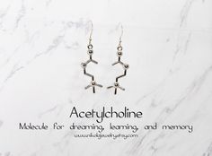 "Silver Acetylcholine Earrings. Acetylcholine is the molecule responsible for triggering dreaming, memory and learning - making these tiny earrings the perfect little gift for that space cadet in your life. Allow this piece to help the wearer keep both feet on the ground and their head out of the clouds! Molecule measures: 1.3 x 3.5 cm (0.5 x 1.4\") Purchase includes a molecule information card, a natural jewelry box, and gift packaging. Gift? Add-on a hummingbird card for only $7: https://www.e Chemistry Jewelry, Science Jewelry, Necklace Extender, Tiny Earrings, Fancy Jewellery, Diy Wire Jewelry, Nature Jewelry, Sterling Earrings, Leather Cord