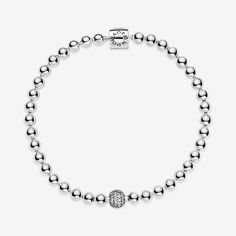 Create a chic look with this sterling silver bracelet. The bracelet draws inspiration from punk styles and adds a polished, refined twist. The fully beaded chain features one larger pavé-set bead and the new barrel clasp design. The bracelet is designed to be worn alone or stacked with other bracelets in different metal finishes for the ultimate look. Available in-store and online. | Pandora Beads & Pavé Bracelet in Sterling silver in Various Sizes Pandora Bangle Bracelet, Pandora Bangle, Pave Bracelet, Diy Jewelry Gifts, Lucky Jewelry, Pandora Beads, Bracelet Pandora, 925 Silver Bracelet, Pandora Silver