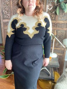 "Vintage 80s/90s black, white and gold glam knit sweater by Petite Sophisticate. Pullover with gold pearls.  33% wool, 31% nylon, 30% acrylic, 6% other fibres. Hand wash, dry flat. Excellent vintage condition! No stains or holes.  Size: tagged M. Always refer to measurements for more accurate sizing. Measurements taken laying flat/Double number where applicable: STS: 18\" PTP: 20-24\" across Bottom hem: 14-22\" across SL: 16.5\" inseam, 7.5-9\" width L: 26\" ALL SALES ARE FINAL SO PLEASE DOUBLE CHECK THE MEASUREMENTS PRIOR TO BUYING AND DON'T HESITATE TO REACH OUT IF YOU HAVE ANY QUESTIONS!  All items are vintage/preloved and may have small imperfections. This should be expected for secondhand clothing. ALL MAJOR FLAWS WILL BE NOTED IN THE DESCRIPTION AND PHOTOGRAPHED." Chic Gold Winter Sweater, Elegant Gold Sweater For Winter, Elegant Gold Winter Sweater, Chic Gold Sweater For Fall, Chic Gold Long Sleeve Sweater, Gold Knit Winter Sweater, Gold Knit Sweater For Winter, Terry Cloth Dress, Black White And Gold