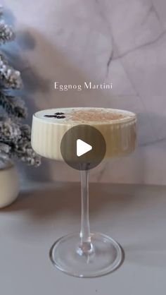 a video demonstrating how to make an eggnog martini for christmas or new year's eve