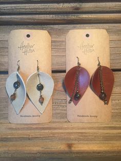 Rustic teardrop genuine leather handmade earrings with antiqued brass chain and beads accented by handmade glazed pottery beads.  Each pair is unique, with individually handmade and glazed pottery beads and accent pieces.  Perfect for all seasons.  Wear with a basic tee or with your favorite sweater.  Have a friend who is impossible to buy for?  Give them a unique one of a kind handmade treasure!  Each pair is handmade from the best findings and each piece will show unique variations of color an Rustic Brown Teardrop Jewelry, Handmade Leather Teardrop Earrings, Rustic Leather Dangle Jewelry, Handmade Brown Bohemian Teardrop Earrings, Rustic Handmade Leather Jewelry, Artisan Leather Teardrop Earrings, Bohemian Leather Teardrop Earrings, Handmade Brown Teardrop Dangle Earrings, Bohemian Teardrop Leather Earrings