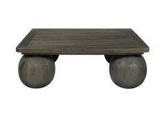 a wooden table with two metal wheels on the bottom and one foot in the middle