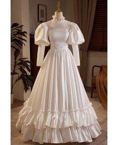 Buy vintage inspired bubble long sleeved satin wedding dress with collar at wholesale price online. Free shipping and pro custom service since 2009. Wedding Dress Peter Pan Collar, Luxury Vintage Dresses For Cosplay, Medieval Clothing Wedding Dress, Luxury White Elegant Victorian Dress, Puff White Dress, Luxury Ruffled Vintage Dress For Vintage Events, Luxury White Victorian Dress, Luxury Victorian Dress With Ruffles In Satin, Luxury White Victorian Dress For Vintage Events