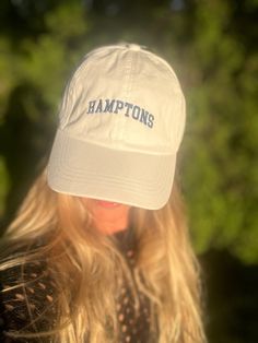 Look chic on the beach with this stylish "Hamptons" hat! The HAMPTONS New York logo embroidered on the front is perfect for a day of summer fun. One size fits most, so pack it up and show off your Hamptons style on vacation (or your backyard!). Spring Vacation Cotton Baseball Cap, Casual Vacation Hats With Embroidered Logo, Casual Summer Hats With Embroidered Logo, Adjustable Summer Baseball Cap With Embroidered Logo, Summer Adjustable Baseball Cap With Embroidered Logo, Comfortable Cotton Baseball Cap For Summer, Summer Vacation Dad Hat, One Size Fits Most, Summer Wide Brim Hat With Embroidered Logo, Summer Hats With Embroidered Logo