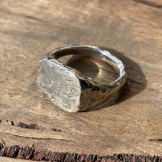 This beautifully textured, rugged version of our Classic Signet Ring is ready for anything life throws at it. Simple. Striking. Comfortable. These timeless signet rings are meticulously crafted by hand in our Melbourne workshop, created out of wax and then cast into precious metal. Made with the highest quality Australian sterling silver to last forever. Made solid, not hollow like many others, all of our rings are hand-stamped with a Sterling Silver (925) hallmark and Custom Creed makers mark a Signet Rings, Size 10 Rings, Black Ribbon, Precious Metal, Perfectly Imperfect, Signet Ring, Creative Projects, Makers Mark, Precious Metals