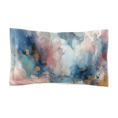 a rectangular pillow with an abstract painting on the front and back cover in blue, pink, gold and white