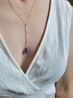 Beautiful Labradorite Waterfall Necklace. Always a gorgeous and magical gemstone! Wear this with a V neck or over a t-shirt for a more casual look. The length of the drop from the little center circle down to the bottom of the stone is just over 2 1/2 in. The chain on the drop is a beautiful bar chain. Each Labradorite is unique and will slightly vary as they are natural. Some will have more of a blue color and others may be more green, yellowish-green, purple-blue, and silverish. If you have a Waterfall Necklace, Yellowish Green, Beautiful Bars, Earring Necklace, Labradorite, Gold Filled, Casual Looks, Blue And Purple, Blue Color