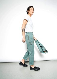 Express your individuality with The Essential Trouser from Wildfang, perfect for gender fluid individuals who value both comfort and style. These versatile trousers are designed to fit and flatter any body type, making them a staple in any wardrobe. Whether you're dressing up or keeping it casual, these trousers are the ultimate in flexible fashion. 🌈 Gender Fluid Fashion, Gender Neutral Clothes, Gender Fluid, Classic Trousers, Roll Up, Tapered Legs, Body Types, Wardrobe Staples, Work Outfit