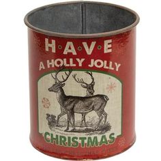 an old fashioned christmas tin with deer and holly jolly on the inside, says have a holly jolly christmas