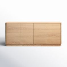 the sideboard is made out of wood and has four doors on one side, two drawers