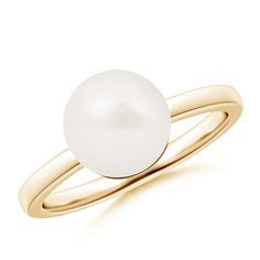 Set on 14k gold band is a Freshwater pearl glowing magnificently. The glossy round pearl resembles the full moon and captivates the senses with its sheer elegance. It's a classic pearl ring that accessorizes well with every outfit. Classic Pearl Ring With Pearl Drop, Classic Round Pearl Ring With Pearl Drop, Classic White Pearl Ring With Pearl Charm, Classic White Pearl Ring With Charm, Classic White Pearl Ring With Drop Detail, Classic White Pearl Ring, White Pearl Drop Ring, Classic Yellow Gold Pearl Ring With Charm, Elegant White Pearl Ring