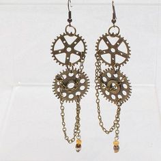 Steam Punk Earrings gears by JackieLittleMiller on Etsy Steam Punk Earrings, Jewelry Diy Tutorials, Small Bissiness, Apocalyptic Jewelry, Punk Jewelry Diy, Chandelier Jewelry