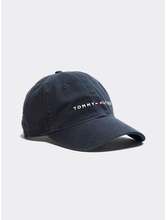 Tommy Hilfiger unisex hat. Top off your look with our premium cotton cap made complete with our embroidered Tommy logo.  Material: 100% Cotton. Cotton Hat With Logo And Curved Visor, Cotton Curved Visor Hat With Logo, Cotton Hat With Curved Visor And Logo, Cotton Baseball Cap With Curved Brim And Logo, Trendy Baseball Cap With Logo And Curved Brim, Cotton Baseball Cap With Logo, Curved Bill Cotton Baseball Cap With Logo, Casual Cotton Dad Hat With Logo, Cotton Dad Hat With Logo And Curved Bill