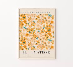 an orange and green flowered book cover on a white surface with the title papers decoudess