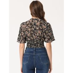 The floral cropped top is a summertime essential with its smocked hem and sweet flare short sleeves. The vintage-inspired floral print blossoms on this chiffon blouse, enhanced by gracefully flared sleeves. It offers a romantic look with its shirred hem, perfect for casual outings, vacations, or daily wear. Pair it with shorts, jeans, or skirts for a sweet look. The model is wearing size XS, and the top is designed for a regular fit. Made from 100% polyester, it is machine washable in cold water Trendy Smocked Short Sleeve Top, Trendy Smocked Top With Short Sleeves, Trendy Short Sleeve Smocked Top, Casual Floral Print Smocked Top, Casual Black Smocked Top For Fall, Casual Smocked Top With Elastic Waistband, Casual Smocked Top With Short Sleeves And Elastic Waistband, Black Summer Top With Elastic Waistband, Chic Black Smocked Top With Floral Print