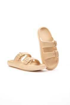 Discover the ultimate in comfort with Maibulun's Marshmallow Step Double Strap Sandals. These lightweight sandals feature a soft cushion and anti-slip sole for all-day wear. And with anti-odor material, your feet will stay fresh and comfortable. Perfect for any casual occasion. 0.98" Heel Slip-on / Buckle closure 100% pure thermoplastic upper 100% Thermoplastic Inner 100% Thermoplastic Sole Feature: Ultimate lightweight soft cushion. Anti-slip bulge sole™. Anti-odor tech material™. Beige Round Toe Sport Sandals For Beach, Comfortable Slippers With Buckle Closure For Vacation, Beige Slide Footbed Sandals For Beach, Slip-resistant Sandals With Round Toe For Vacation, Beige Slip-on Sport Sandals For Vacation, Comfortable Beige Sport Sandals With Round Toe, Comfortable Beige Sport Sandals, Casual Beige Slides With Buckle Closure, Beige Closed Toe Footbed Sandals For Beach