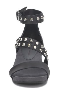 Polished dome studs bring a bit of moto edge to this distinguished block-heel sandal. Adjustable ankle strap with buckle closure; hidden elastic inset Leather upper/synthetic lining/rubber sole Imported Studded Leather Sandals With Open Heel, Studded Flat Heel Sandals For Spring, Studded Leather Open Heel Sandals, Leather Sandals With Studs And Open Heel, Spring Open Toe Sandals With Rivets, Spring Sandals With Studs And Flat Heel, Spring Rivets Open Toe Sandals, Spring Flat Heel Sandals With Studs, Chic Ankle Strap Sandals With Studs