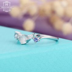 Moonstone Engagement ring white gold Diamond Cluster Ring Tanzanite Aquamarine Wedding Pristine Promise Birthstone Anniversary gifts for her≫≫ Item Details❀❀❀ Make every ring to order, all rings are handmade in the United States.❀❀❀ Metal(Nickel Free): Solid 14K & 18K Gold❀❀❀ Gold Color: Rose gold, Yellow gold, White gold❀❀❀ Moonstone & Tanzanite & Aquamarine & Natural conflict-free Diamond Natural conflict-free Diamond :about 0.1CT❀❀❀ Ring band:about 1.6mm(width),1.2mm(thickness)❀❀❀ Gem: about White Amethyst Wedding Ring In Fine Jewelry Style, Fine Jewelry White Amethyst Wedding Ring, Silver Moonstone Ring With Halo Setting For Wedding, White Amethyst Wedding Ring Fine Jewelry, White Gemstone Promise Ring, White Gemstone Birthstone Promise Ring, White Birthstone Promise Ring With Gemstone, White Multi-stone Moonstone Ring For Formal Occasions, Elegant White Amethyst Wedding Ring