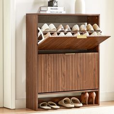 This shoe cabinet features a unique wavy groove panel that enhances the texture and visual depth of the space. The simple lines and gold metal handle design are full of modernstyle, creating a personalized and unique beauty. Modern Entry Shoe Storage, Narrow Shoe Cabinet Entryway, Mid Century Modern Shoe Cabinet, Small Foyer Shoe Storage, Slim Shoe Cabinet Entryway, Fluted Shoe Cabinet, Mid Century Shoe Cabinet, Show Cabinet Entryway, Front Hall Closet Makeover