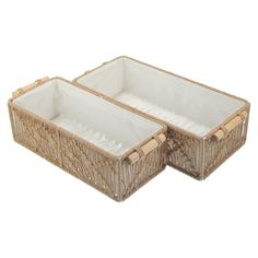 two wicker baskets with bamboo handles on white background