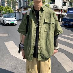 Wiaofellas - Summer Half leeve Cargo Men Shirts Japanese Ins Casual Blouse Trendy Y2K Chic Loose Shirts Biker Motor Big Size Loose Streetwear ◆M Length:70cm Bust:60cm Sleeve:18cm Shoulder:60cm◆L Length:72cm Bust:62cm Sleeve:19cm Shoulder:62cm◆XL Length:72cm Bust:64cm Sleeve:20cm Shoulder:64cm◆XXL Length:76cm Bust:66cm Sleeve:21cm Shoulder:66cm ◆Size Issue: All measurement in cm and please note 1cm=0.39inch,1 inch=2.54cm, due to the manual measurement, please allow 1-3cm difference. ◆The Size is Urban Style Solid Color Summer Top, Urban Solid Color Summer Tops, Urban Summer Tops, Casual Khaki Tops With Pockets, Khaki Short Sleeve Shirt For Streetwear, Green Casual Short Sleeve Shirt With Pockets, Spring Streetwear Khaki Top, Khaki Tops For Spring Streetwear, Casual Green Short Sleeve Shirt With Pockets