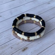 "This listing is for ONE custom heishi bracelet with double gold accent beads.  These stylish bracelets can be worn alone or in a custom stack. Choose your color and bracelet size.  Lots of colors are available!  These bracelets look great stacked with 14K Gold filled beaded bracelet linked below. https://www.etsy.com/listing/1259253322/14k-gold-filled-stacking-bracelet-gold These bracelets make a perfect gift!  Family/Mama - Mother's Day / Mama-to-Be / Baby shower / Siblings Friends - Birthday Bracelet Clay, Bff Photos, Team Bracelets, Heishi Bracelet, Homemade Bracelets, Womens Bracelet, Disc Bracelet, Beaded Jewlery, Clay Bracelet