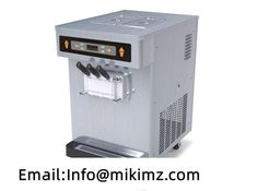 a machine that is sitting on top of a white background with the words email info @ mikinz com