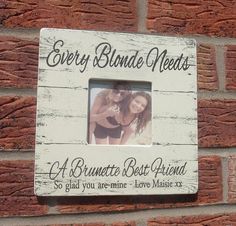 there is a white frame on the brick wall with a picture in it that says every binde needs