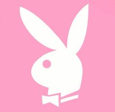 a white rabbit head with a bow tie on it's neck and pink background