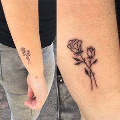 two tattoos that have roses on them and one has the same tattoo as the other