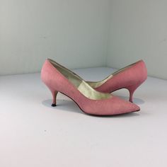 "Circa: 1950s 1960s  Show off to your very very best in these delightfully feminine Dusty Rose Pink Linen Lower heeled pumps for easy walk and dance comfort. A perfect modern size and what a colour for the coming Spring/Summer DO YOU ACCEPT OFFERS? We do NOT accept offers, offer discounts nor negotiate on pricing. We do offer layaways and have sales throughout the year. Shipping overages are always refunded. Label: QualiCraft Fabric: man made outer sole, linen over leather Condition: Excellent V Classic Pink Heels For Party, Pink Pointed Toe Kitten Heels For Formal Occasions, Feminine Pink Kitten Heels For Formal Occasions, Pink Low Heel Kitten Heels For Formal Occasions, Pink Kitten Heels For Formal Occasions, Pink Almond Toe Court Shoes For Evening, Pink Formal Kitten Heels With Sculpted Heel, Classic Pink Heels For Evening, Classic Pink Heels With Sculpted Heel