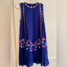 Blue Floral Sleeveless Dress Women’s Large. Never Worn. Sleeveless Blue Summer Dress, Blue Sleeveless Backless Dress For Summer, Blue Sleeveless Summer Sundress, Blue Sleeveless Maxi Dress For Spring, Blue Sleeveless Dress For Spring, Blue Sleeveless Summer Dress For Day Out, Casual Blue Sleeveless Sundress, Blue Sleeveless Boho Sundress, Blue Bohemian Sleeveless Mini Dress