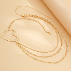 Hello, style mavens! 💛✨ Introducing the Hollow Gold Love Heart Waist Chain, a captivating piece that brings a touch of romance and creativity to your accessory collection. Perfect for adding a sexy flair to your look, this multilayer waist chain is designed to turn heads. Why You'll Love It: Romantic Design: Features hollow gold love heart charms that add a playful and romantic touch to the chain. Versatile Wear: Ideal for beach outings, festivals, parties, or enhancing your casual outfits with Trendy Alloy Heart Necklace For Valentine's Day, Valentine's Day Heart Necklace With Clavicle Chain For Parties, Valentine's Day Alloy Heart Necklace With Adjustable Chain, Valentine's Day Party Jewelry With Adjustable Chain, Valentine's Day Party Heart Necklace In Alloy, Valentine's Day Party Alloy Heart Necklace, Heart Shaped Alloy Chain Necklace, Party Heart Necklace With Chain, Valentine's Day Heart Necklace With Adjustable Chain For Party