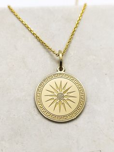 WE SHIP ALL PARCELS IN ONE BUSINESS DAY FOR FREE AND PROVIDE THE SPEEDIEST DELIVERY! Engraved Vergina Sun Design Necklace - Vergina Sun Pendant Necklace - Handmade Vergina Sun Gold Jewelry - Engraved Vergina Sun Gold Necklace Engraved Vergina Sun Pendant Necklace made out of 14K Solid Gold. Available only in Yellow Gold finish. An elegant piece of jewelry that is a perfect gift to yourself and your loved ones. Charm Thickness: 0.5mm Jump Ring inner diameter: 4mm Add your engraved personalization Greek Sun, Sun Of Vergina, Sun Pendant Necklace, Sun Jewelry, Gold Spiritual Necklace With Sun Design, Greek Jewelry Ancient, Sun Pendant Gold, Gold Sun-shaped Necklace Gift, Gold Sun Design Round Pendant Necklace