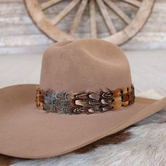 Natural feather hat band. Colors vary from brown, rust, and a hint of blue. Adjustable with leather lace ties.  This hat band is approximately 1.5 inch. Natural feathers Adjustable hatband *This product is for 1 single hat band. Hat not included. Feather Hat Band, Hat Bands, Feather Hat, Pets For Sale, Western Hats, Cowboy Boots Women, Deer Skin, Hat Band, Kids Boots