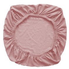 a pink round pillow with ruffled edges on a white background and an image of the bottom